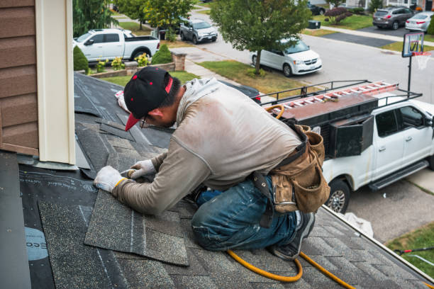 Professional Roofing technician working in Trenton, MI